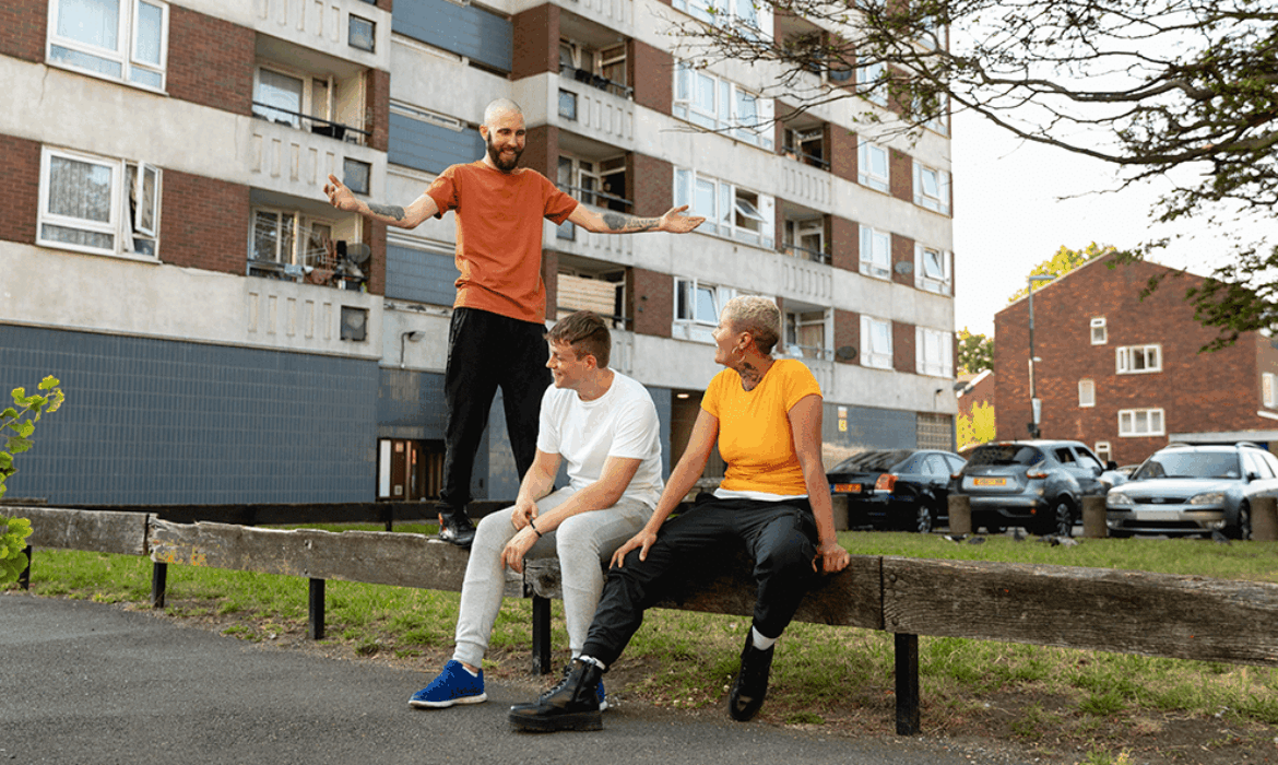 full-shot-friends-sitting-together-suburbs