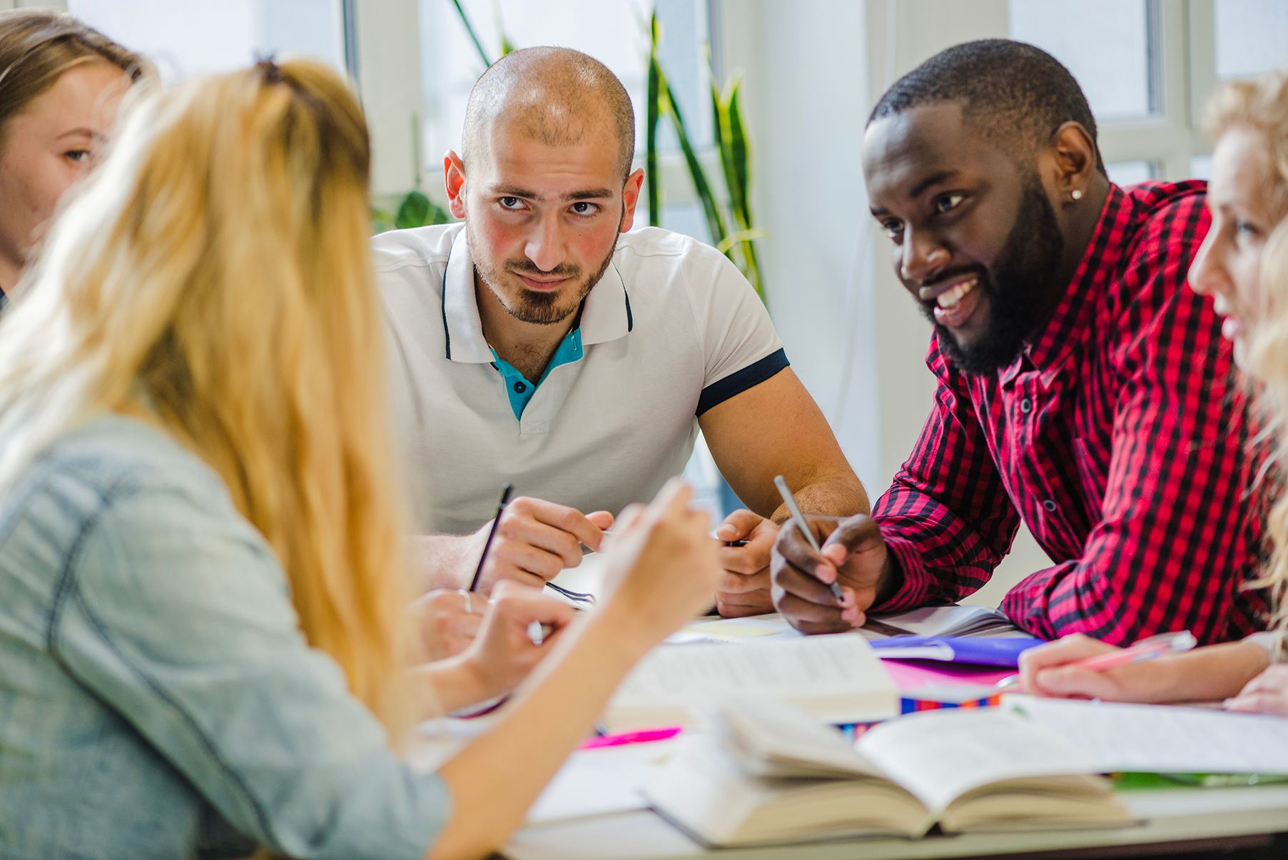 people-table-studying-sharing-ideas