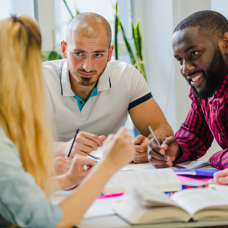 people-table-studying-sharing-ideas